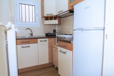 Kitchen or kitchenette, oven, stove