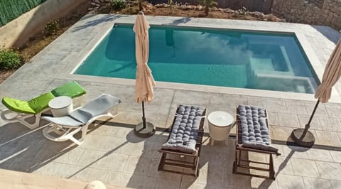 Patio, Natural landscape, Pool view, Swimming pool, sunbed