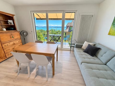 Patio, Living room, Seating area, Dining area, Garden view, Lake view