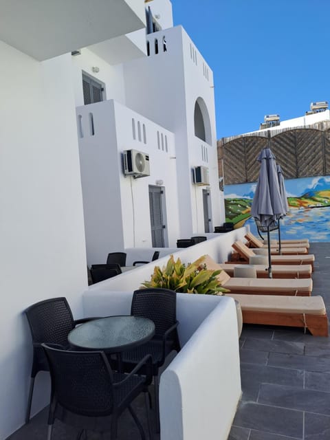 Property building, Patio, View (from property/room), Balcony/Terrace, Pool view, sunbed