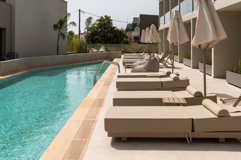 Swimming pool, sunbed