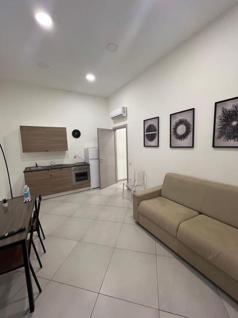 Kitchen or kitchenette, Living room, Seating area, Dining area, air conditioner