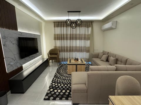 TV and multimedia, Living room, Seating area, Evening entertainment, air conditioner