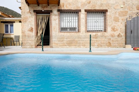 Property building, Living room, Swimming pool