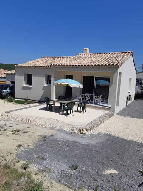 Property building, Patio, Day, Natural landscape, Dining area, Parking