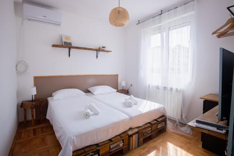 Bed, Photo of the whole room, Bedroom, towels, air conditioner