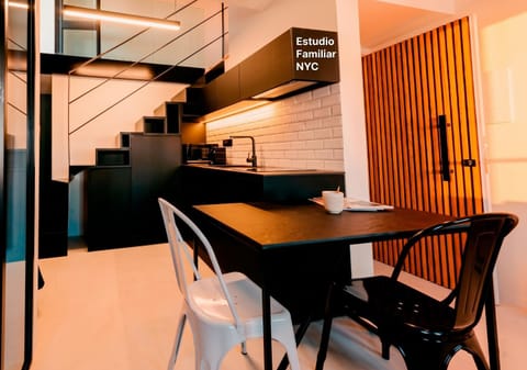Kitchen or kitchenette, Living room, Seating area, Dining area
