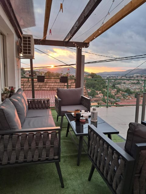 View (from property/room), Balcony/Terrace, Seating area, Sunset