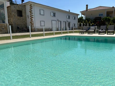 Property building, Pool view, Swimming pool, sunbed