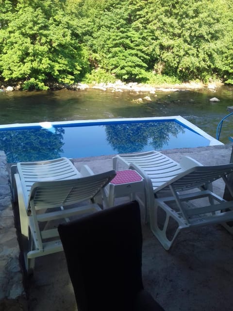 Patio, Natural landscape, Pool view, River view, Swimming pool, sunbed