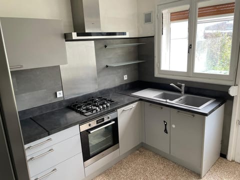 Kitchen or kitchenette, stove