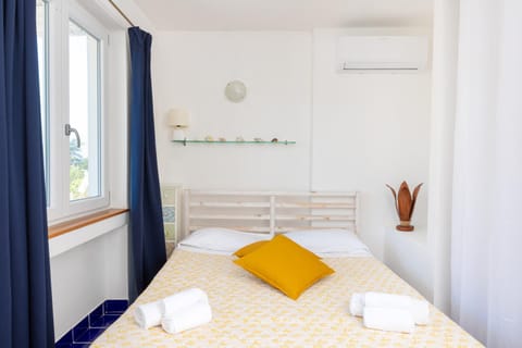 Bed, Photo of the whole room, Bedroom, towels, air conditioner