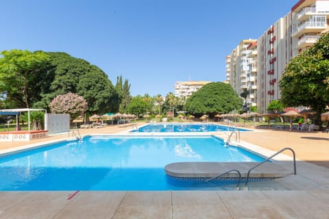 Property building, Living room, Swimming pool