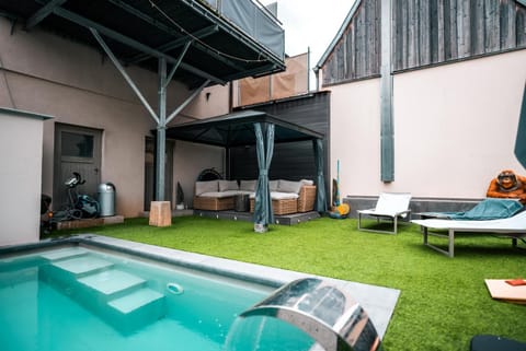 Property building, Living room, Swimming pool
