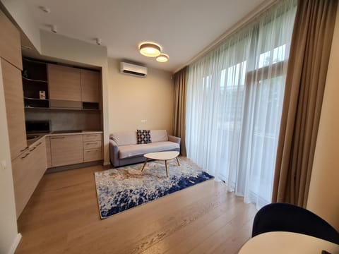 Bed, Kitchen or kitchenette, Living room, Seating area