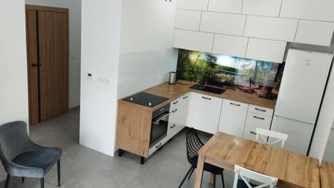 Dining area, dishwasher, oven, stove