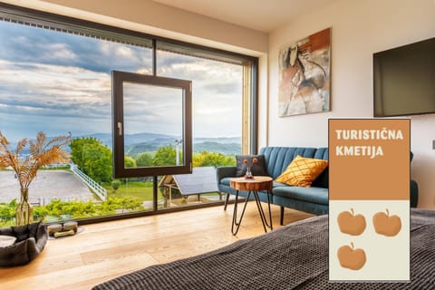 Natural landscape, Horse-riding, View (from property/room), Living room, Seating area, Text overlay, Mountain view