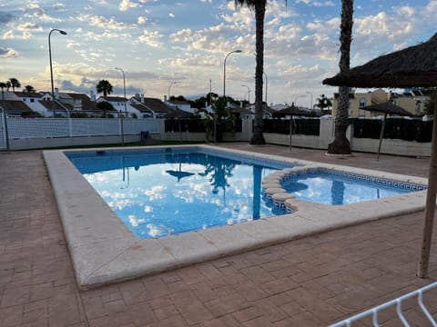 Property building, Living room, Swimming pool