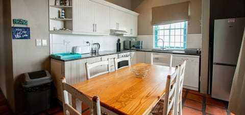 Kitchen or kitchenette, Dining area, dishwasher, oven, stove, toaster