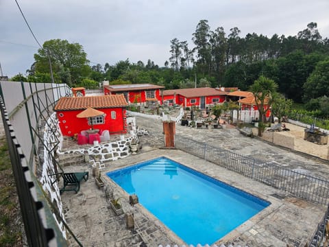Property building, Patio, Natural landscape, Pool view, Swimming pool