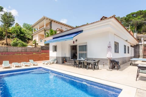 Property building, Living room, Swimming pool