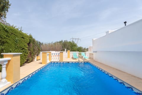 Property building, Living room, Swimming pool