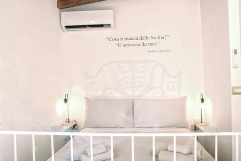 Bed, air conditioner