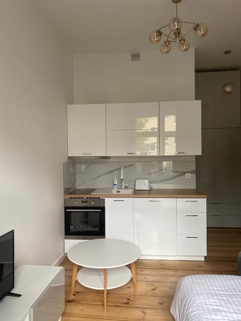 Kitchen or kitchenette, oven, stove