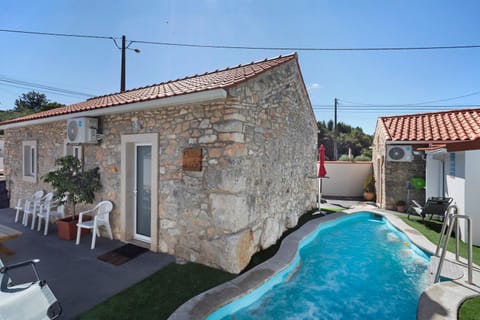 Property building, Living room, Swimming pool