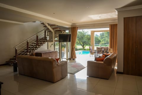 Living room, Seating area, Pool view, Swimming pool