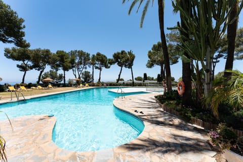 Property building, Living room, Swimming pool