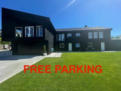 Property building, Facade/entrance, Natural landscape, Garden, Garden, Text overlay, Garden view, Garden view, Street view, Sunset, Parking