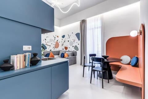 Kitchen or kitchenette, Living room, Seating area, Dining area