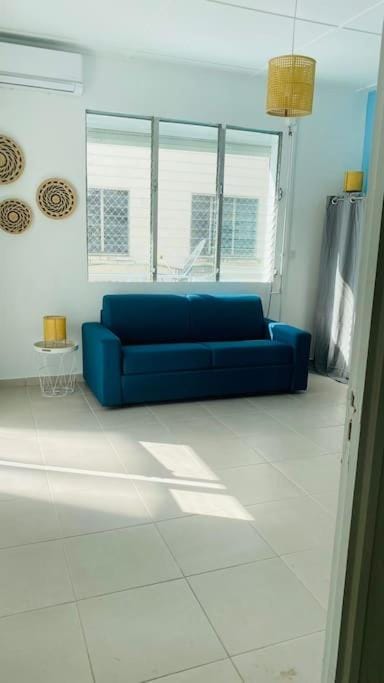 Le Sunshine - Au cœur du centre ville de Pointe- à- Pitre - Proche de tout avec sa grande terrasse ensoleillée Apartment in Les Abymes