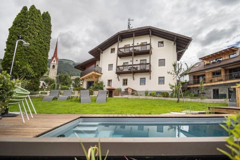 Property building, Living room, Swimming pool