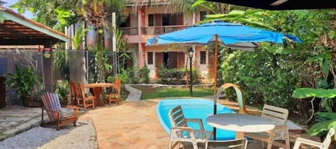 Property building, Patio, Spring, Day, Garden, View (from property/room), Balcony/Terrace, Seating area, Dining area, Garden view, Pool view, Swimming pool, sunbed