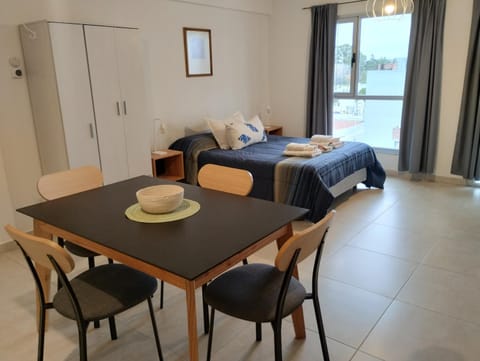 Photo of the whole room, Dining area, heating, towels, wardrobe