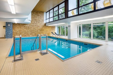 Property building, Living room, Swimming pool