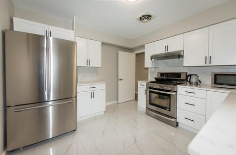 Kitchen or kitchenette, oven, stove