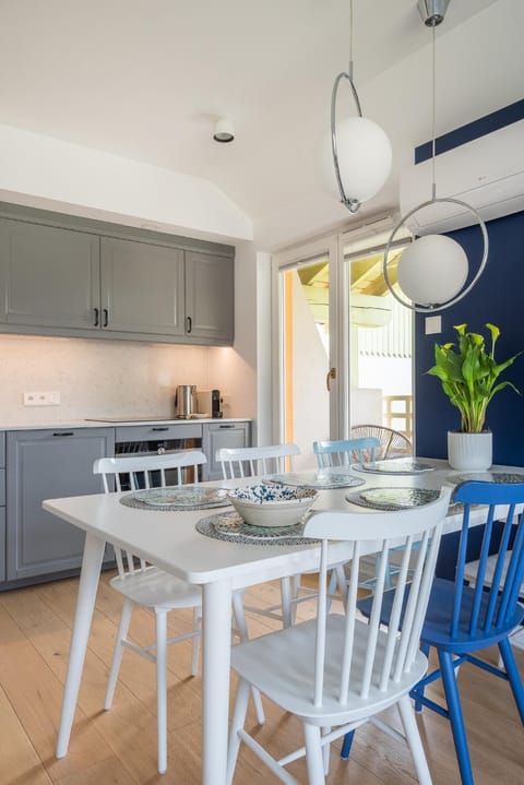 Kitchen or kitchenette, microwave, oven, stove, kitchen, air conditioner