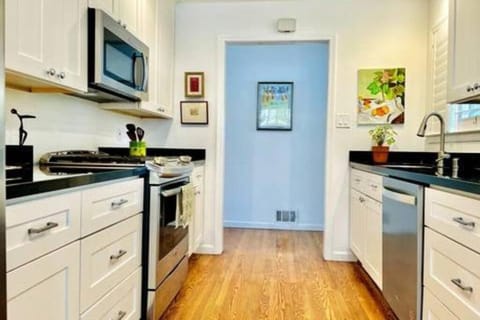 Kitchen or kitchenette, dishwasher, oven, stove, toaster