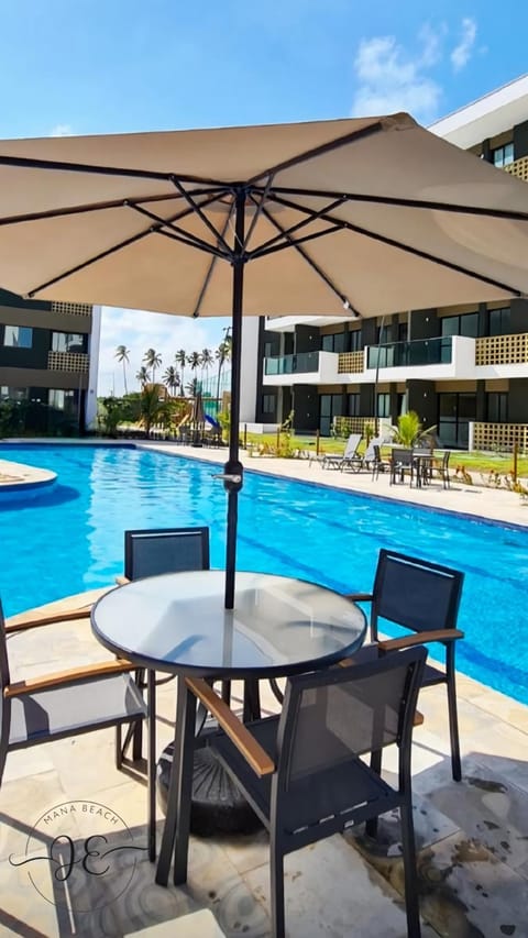 Property building, Pool view, Swimming pool, sunbed
