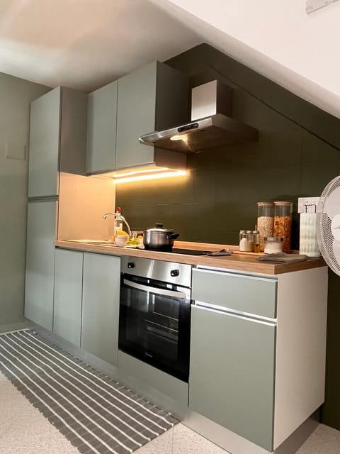 Kitchen or kitchenette, flat iron, oven, stove