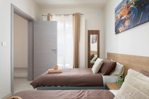 Edka Suites - Modern Sunlit 2BD Apartments with Balconies - Close to Sliema Promenade, St Julian's & St Georges Bay Apartment in Sliema