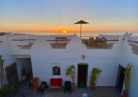 Property building, Patio, Nearby landmark, Day, Natural landscape, View (from property/room), Balcony/Terrace, Sea view, Sunset, Internal: Not applicable to any particular room