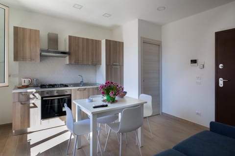 Kitchen or kitchenette, Living room, Seating area, stove