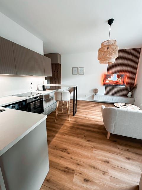 Kitchen or kitchenette, Photo of the whole room, Dining area, stove