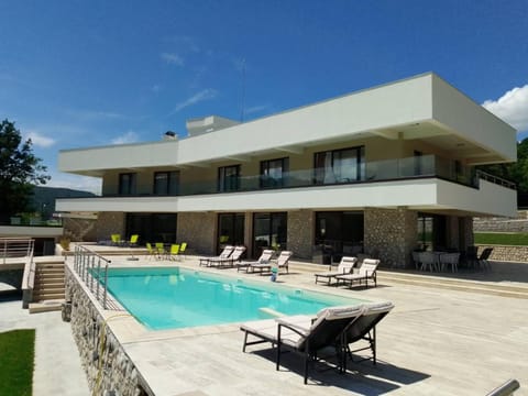 Property building, Patio, Swimming pool