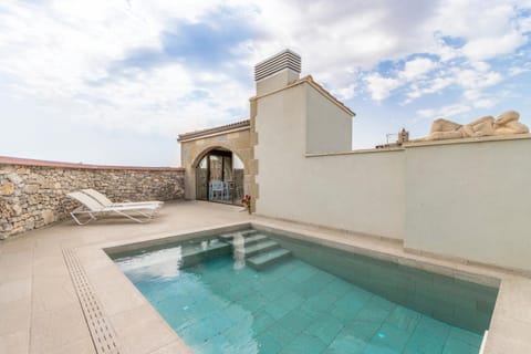 Property building, Living room, Swimming pool