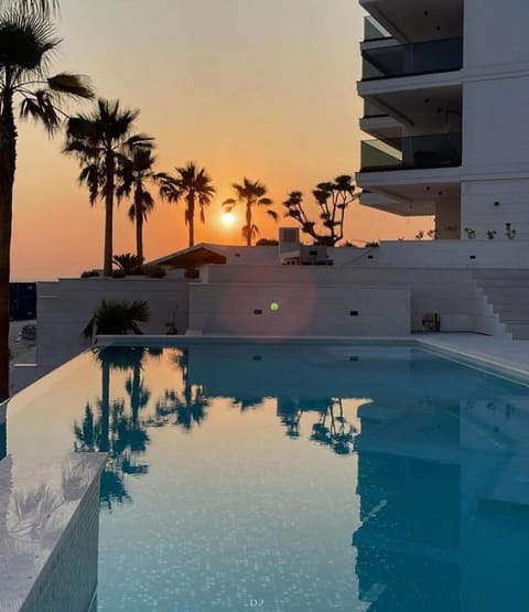 Pool view, Swimming pool, Sunset, sunbed